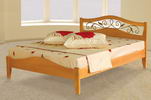 Деревянная кровать с ковкой